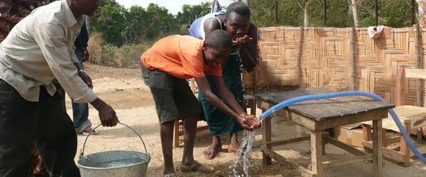 Young Adults Drinking Water Of Life Water